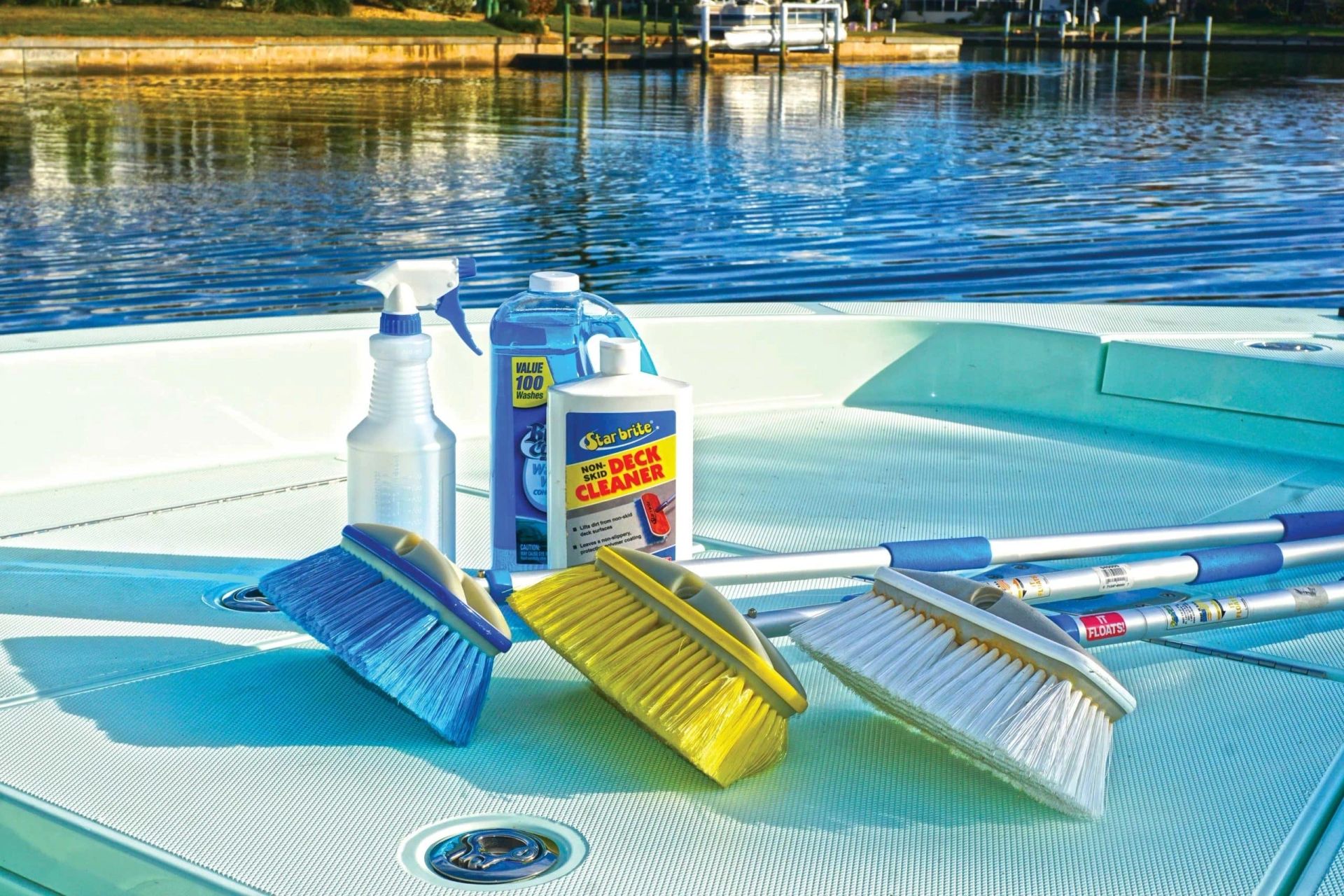 Marine cleaning brushes and products on a boat deck
